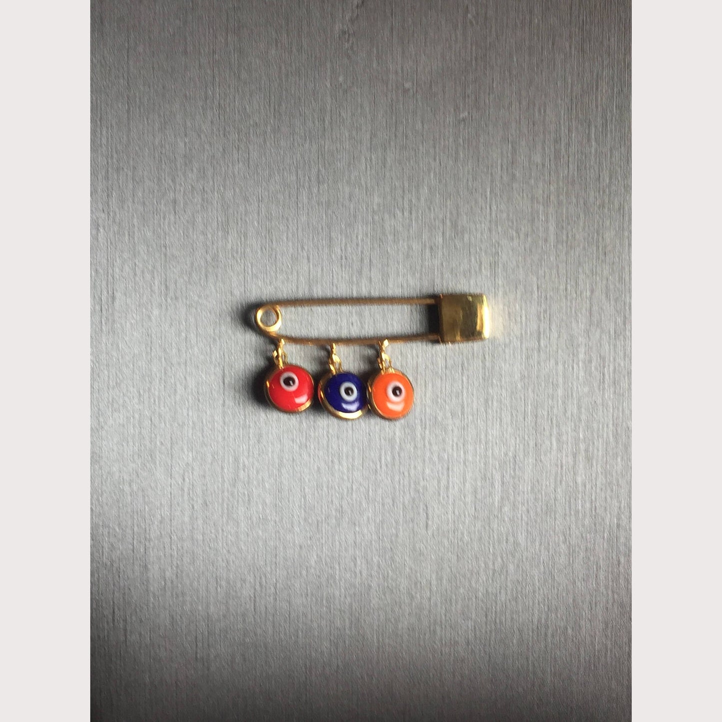 Hye Em Yes-Gold Evil Eye Safety Pin